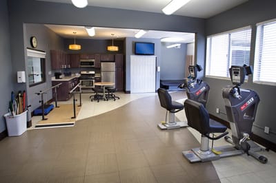 Interior view of a fitness area with exercise equipment