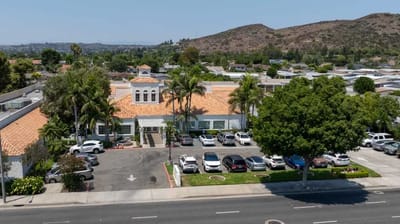 Aerial view of New Orange Hills facility with parking