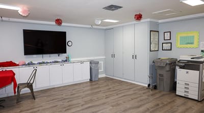 Spacious common room with decorations and furniture