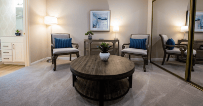 Cozy lounge area with chairs and a coffee table