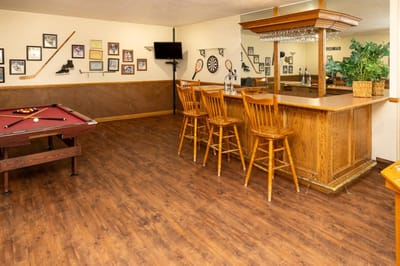 Common area with bar and pool table