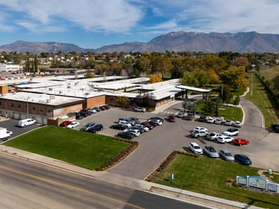 Aerial view of Heritage Park Nursing Center's exterior and parking lot.