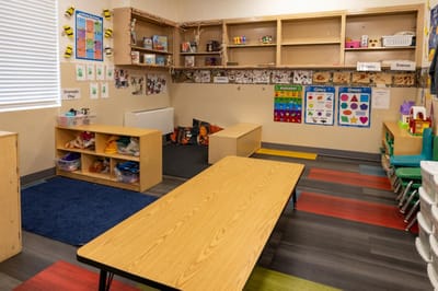 Classroom with shelves and tables for activities
