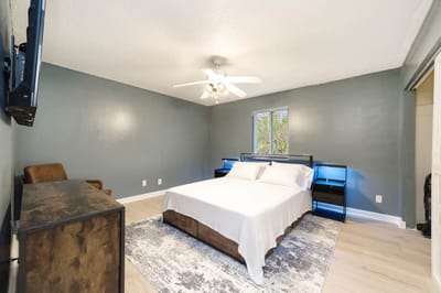 Simple and clean bedroom interior with a bed.