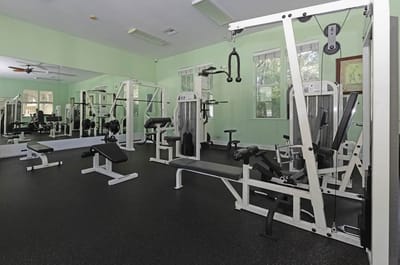 Well-equipped fitness room with exercise machines.
