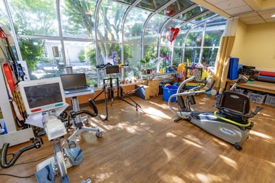 Rehabilitation equipment in a bright, sunny room