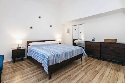 Bright, spacious bedroom with modern decor