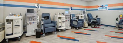 Interior view of a treatment room with medical equipment.