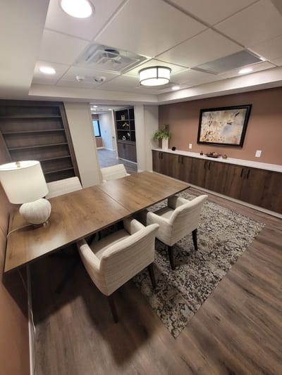 Cozy common area with a table and chairs.
