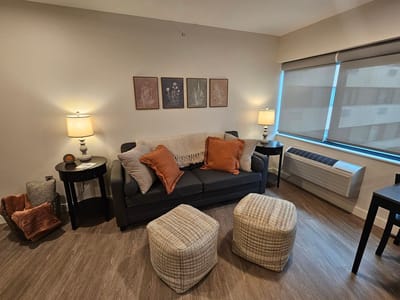 Cozy living area with a sofa and decorative pillows