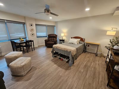 A cozy private resident room with modern furnishings.