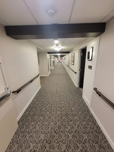 Long hallway in an assisted living facility.