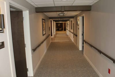 Hallway with framed pictures on the walls