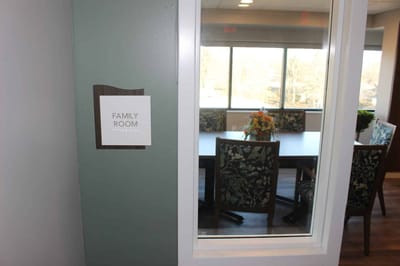 Sign for Family Room with a meeting table