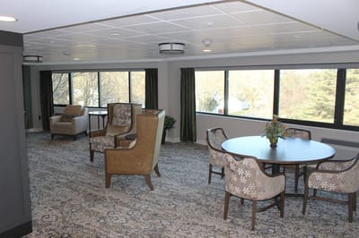 Common area with seating and large windows