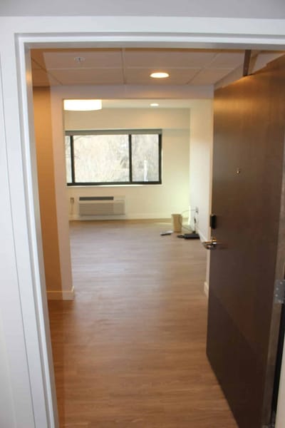View of a resident room with an open door.