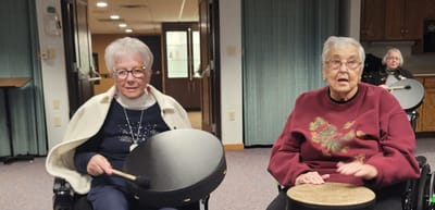 Residents participating in a music activity.