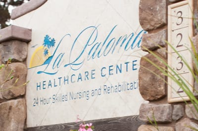 Facility logo on a stone sign