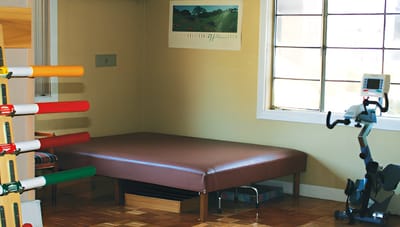 Interior view of a therapy room with equipment