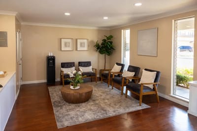 Bright common area with seating and decor