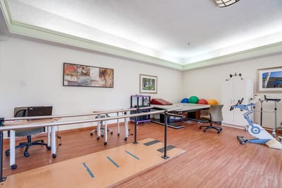 Rehabilitation therapy room with exercise equipment