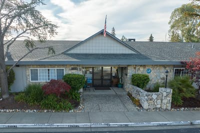 Exterior view of Brookside Skilled Nursing Hospital building