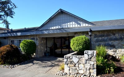 Exterior view of Brookside Skilled Nursing Hospital entrance