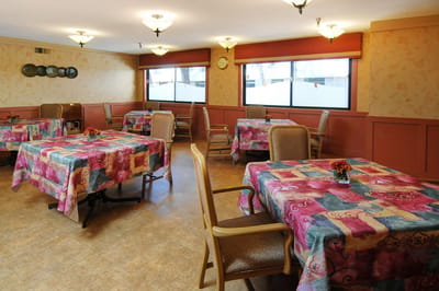 Bright dining room with colorful tablecloths