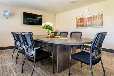 Conference room with a large table and chairs