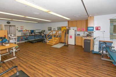 Interior view of a rehabilitation room with equipment