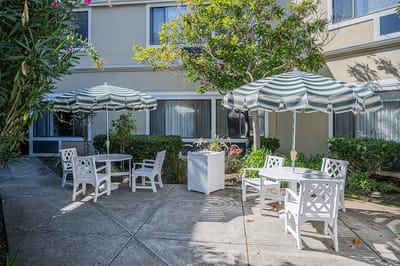 Outdoor seating area with umbrellas and tables