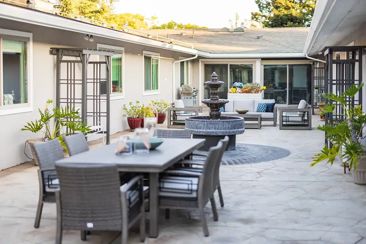Outdoor courtyard with seating and a fountain