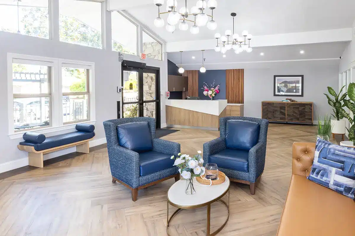Bright common area with comfortable seating and decor