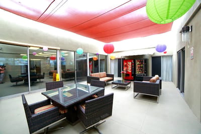 Outdoor seating area with colorful lanterns