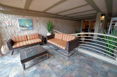 Cozy lounge area with colorful seating in a common space
