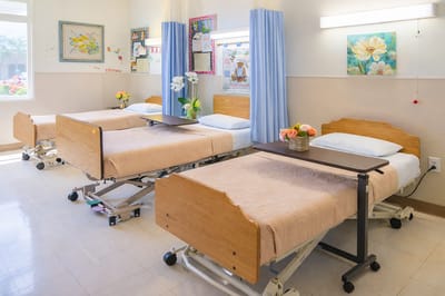 Interior view of a shared resident room with beds