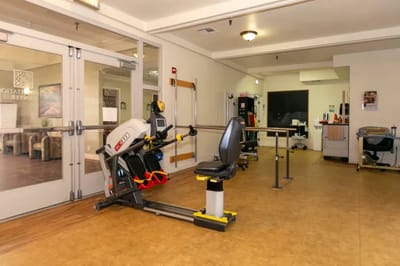 Interior view of a therapy gym with equipment