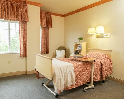 Cozy resident room with a bed and window
