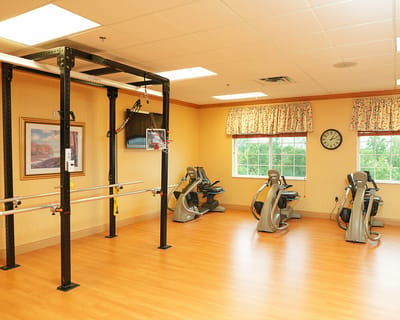 Interior view of a fitness area with exercise equipment