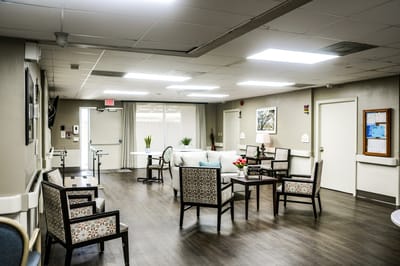 A bright common area with seating and decor