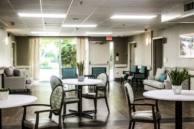 Interior view of a bright common area with seating