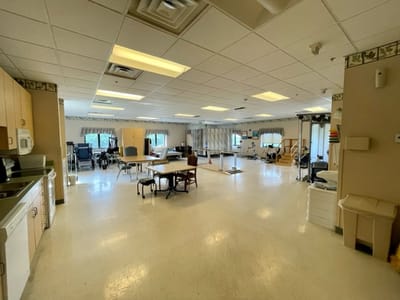 Bright common area with tables and chairs