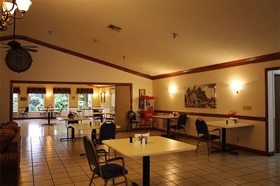 Dining area with tables and chairs in a common space