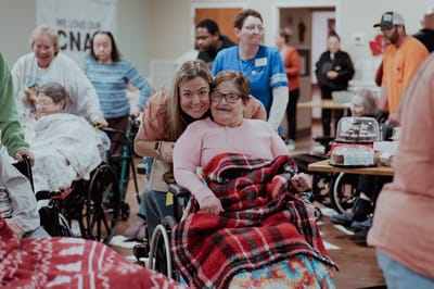 Residents and staff enjoying an activity together