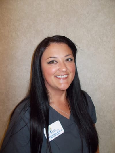 Staff member displaying a name badge