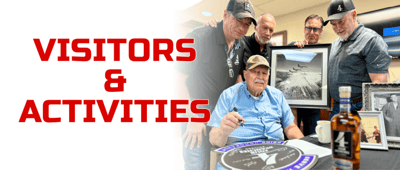 Residents engaging with visitors during an event