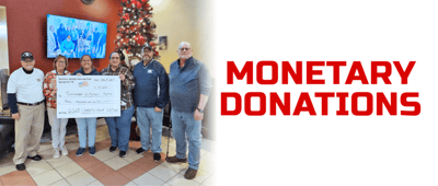 Group donation event with residents and staff.