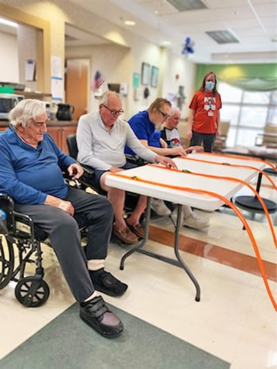 Residents enjoying an activity at a common area.
