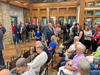 Residents and staff gathering in a common area