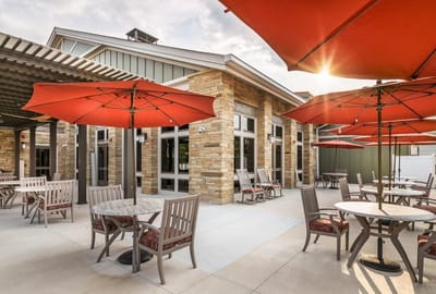 Outdoor seating area with umbrellas and tables